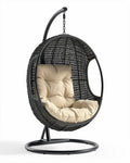 Hangstoel van gevlochten wicker met zacht kussen in zwart en crème 100 x 80 x 120cm